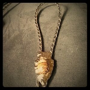 Silver and gold bolo tie